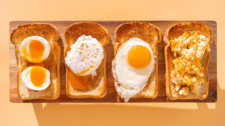 Eggs on toast against a yellow background