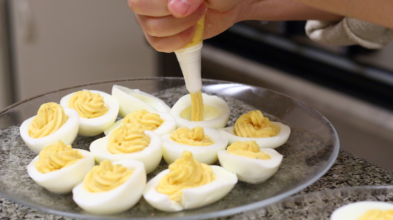 Making deviled eggs