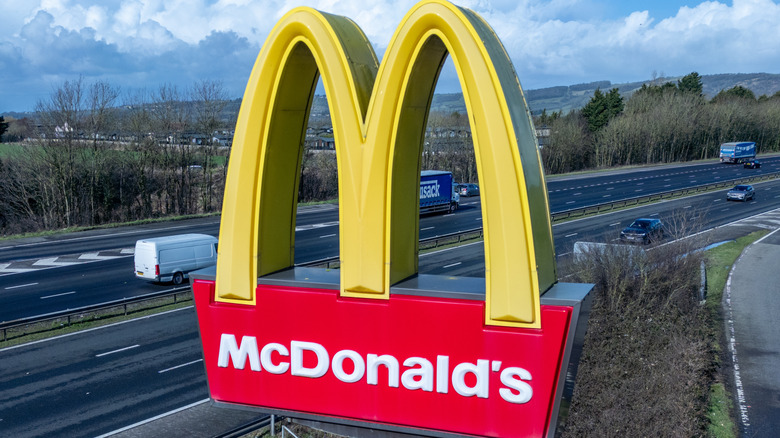 A McDonald's sign beside a highway