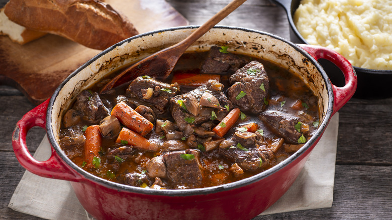 homemade beef bourguignon in enameled cast iron dish