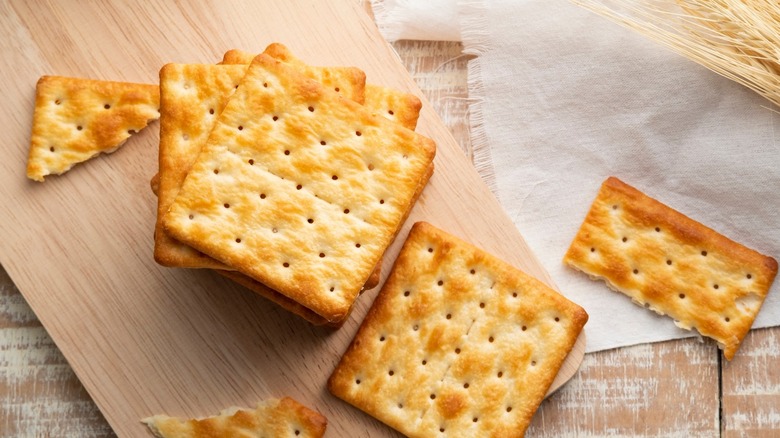 crackers on a wooden board