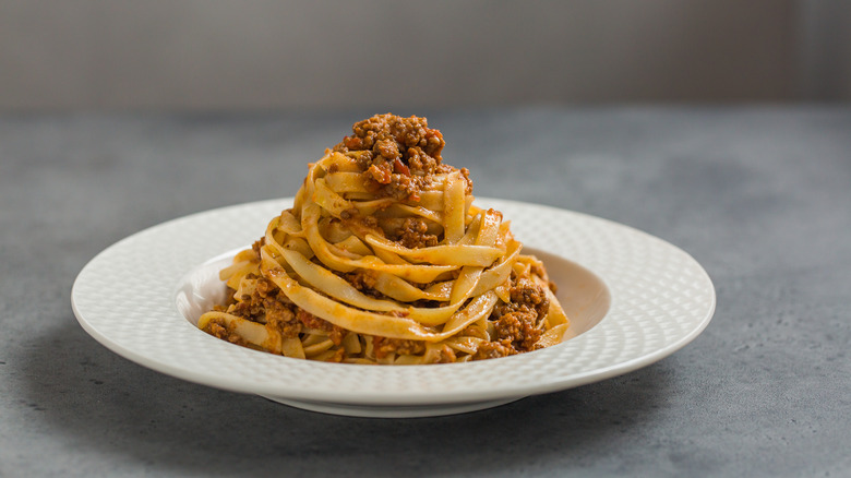 The Meaty Difference Between Bolognese And Sunday Sauce