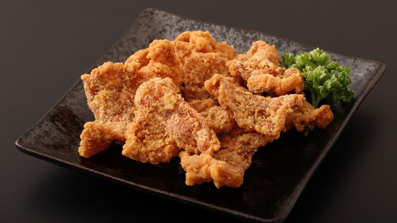 Fried chicken skin on a plate