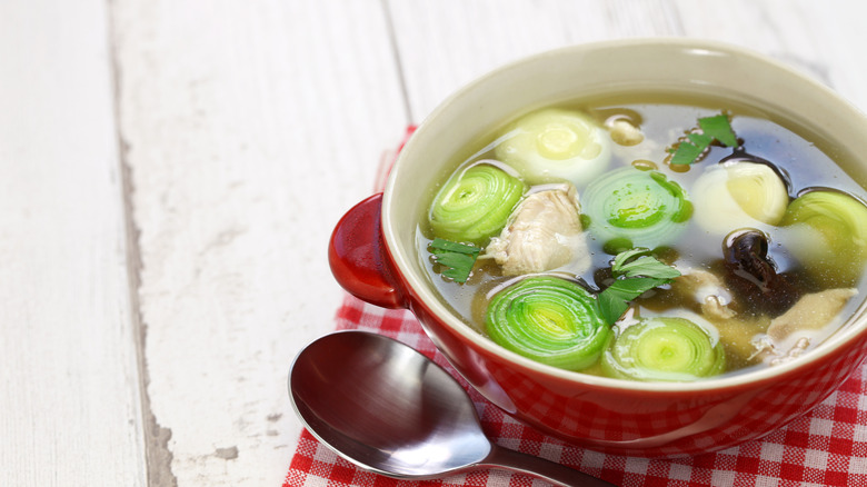 bowl of cock-a-leekie soup with prunes