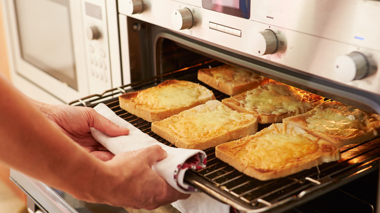 cheesy bread going in oven