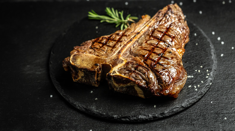 grilled steak covered in salt