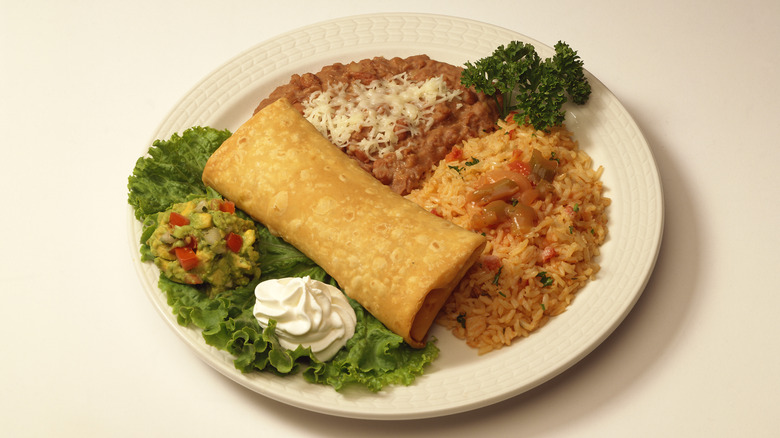 prepared plate with rice as side dish