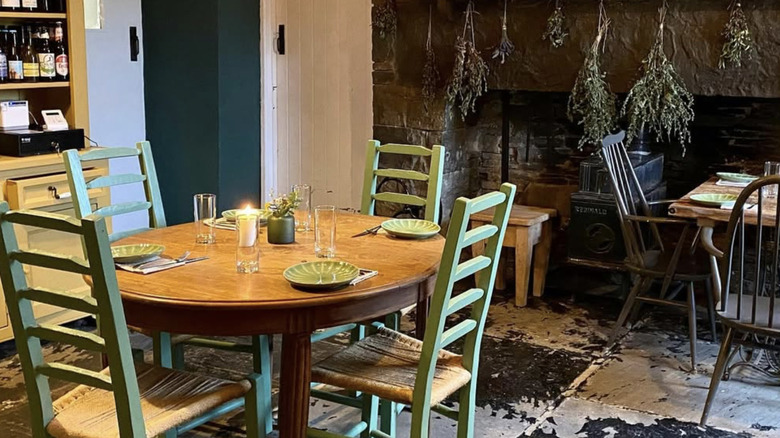 Tables in the interior of the Homestead Cottage