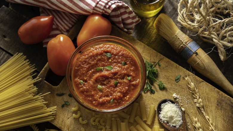 Tomato sauce with pasta, tomatoes, and parmesan