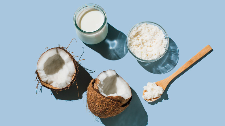 Fresh opened coconut with coconut products