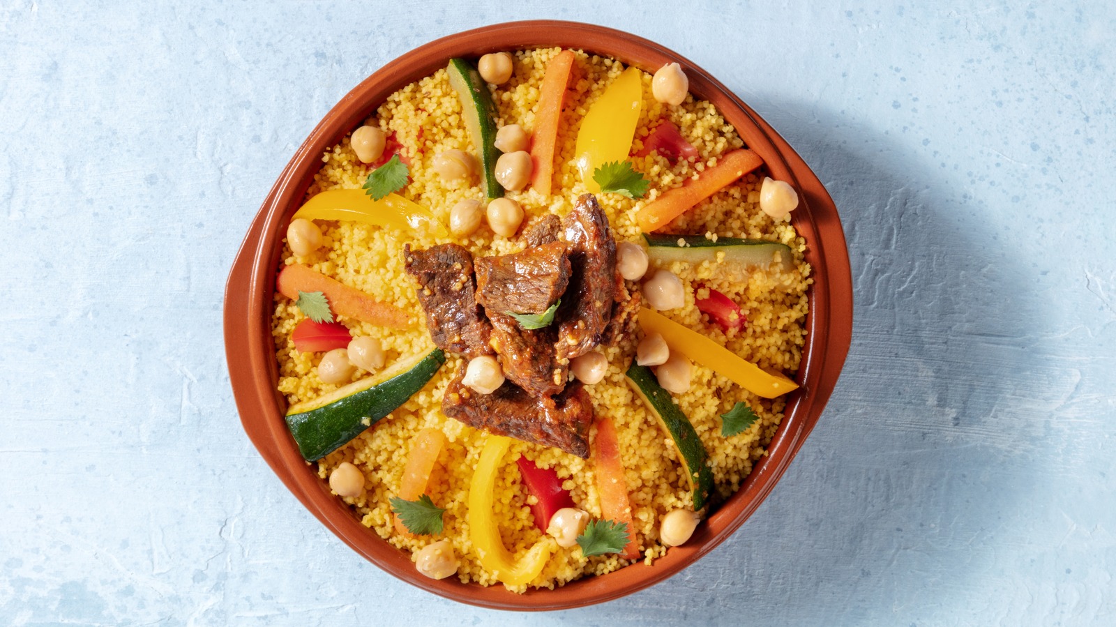 The Mistake Everyone Makes While Fluffing Couscous