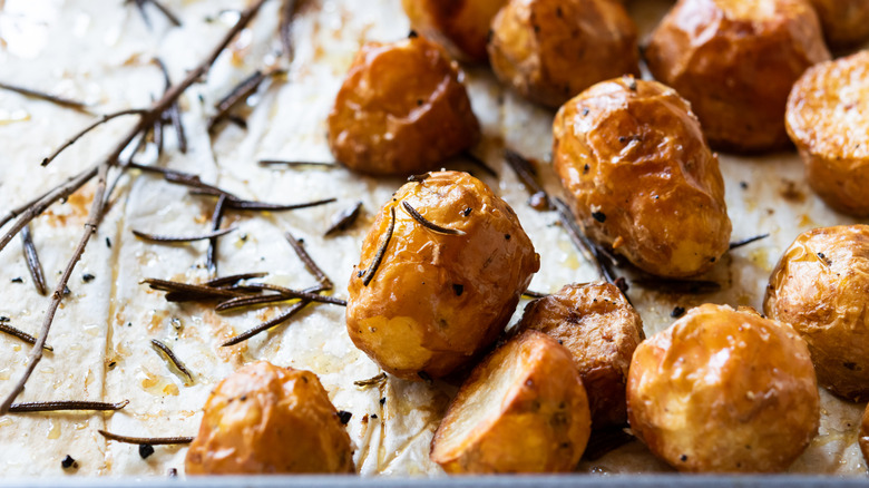 Roasted potatoes sprinkled with rosemary