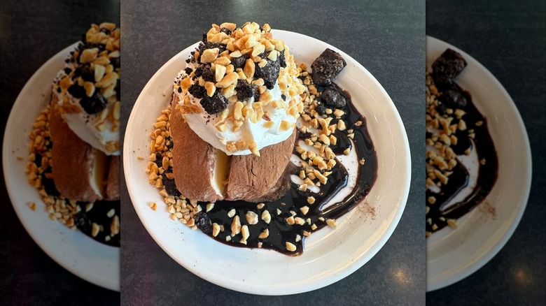 Loaded ice cream potato on white plate