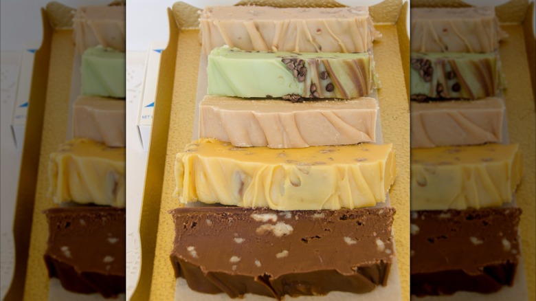 Assorted flavors of Mackinac Island fudge on golden platter