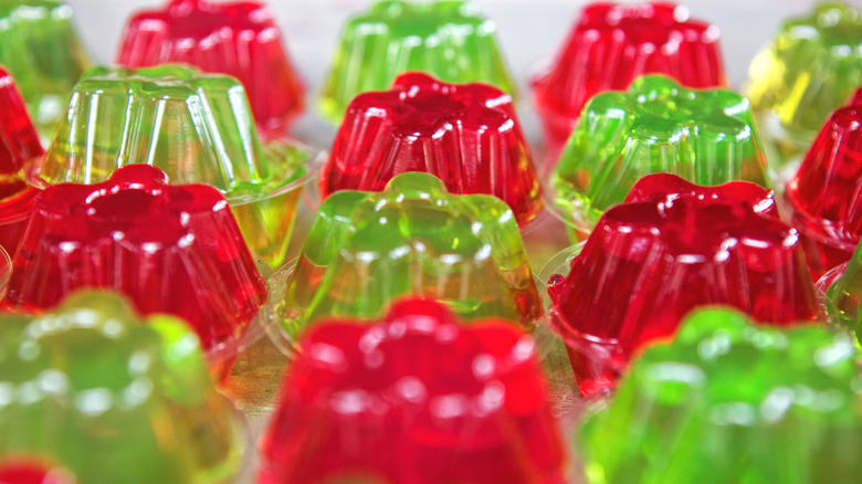 Rows of molded green and red jello snacks