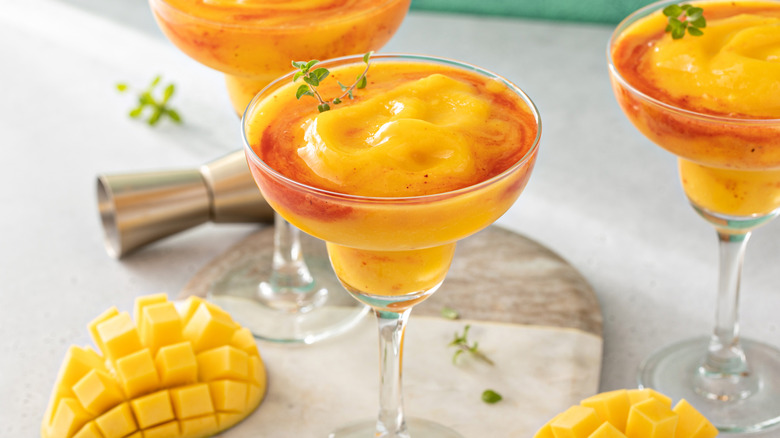 Mangonadas with thyme garnish