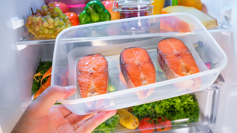 salmon in plastic containers