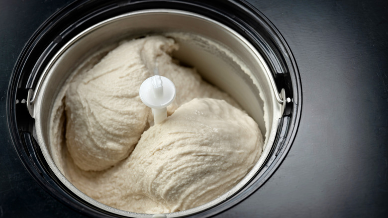 ice cream maker full of vanilla ice cream