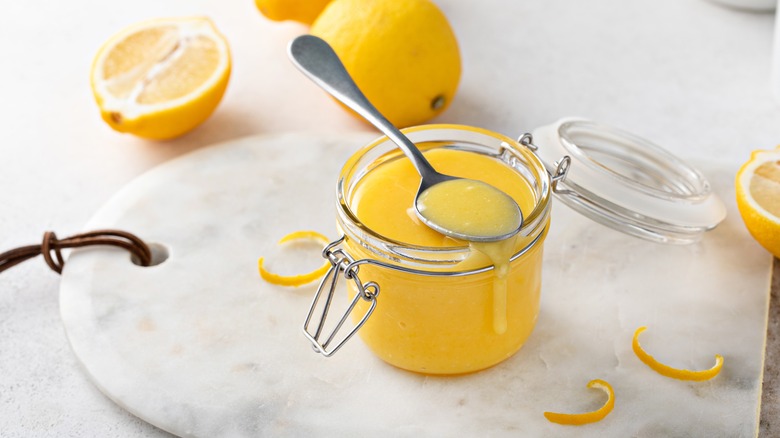 Lemon curd filling in jar