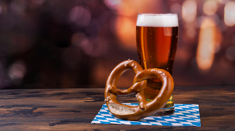 Glass of beer and pretzel