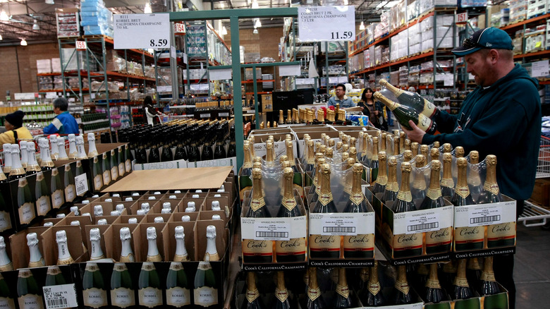 customer browsing in Costco liquor aisle