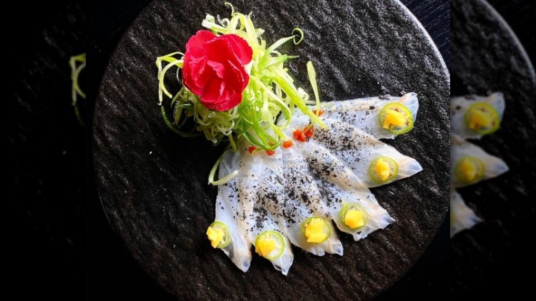 Sashimi with garnish of flower