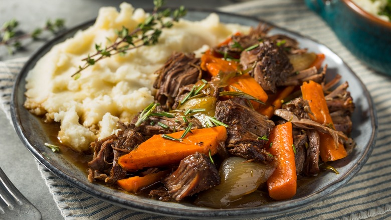 plate of pot roast with mashed potato