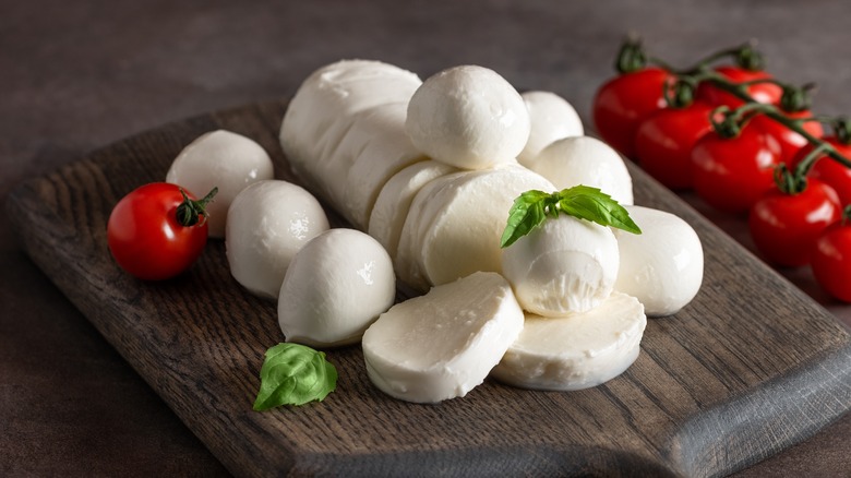 Buffalo mozzarella cheese on a wooden board