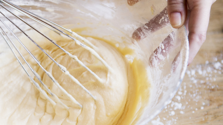 woman mixing cake batter