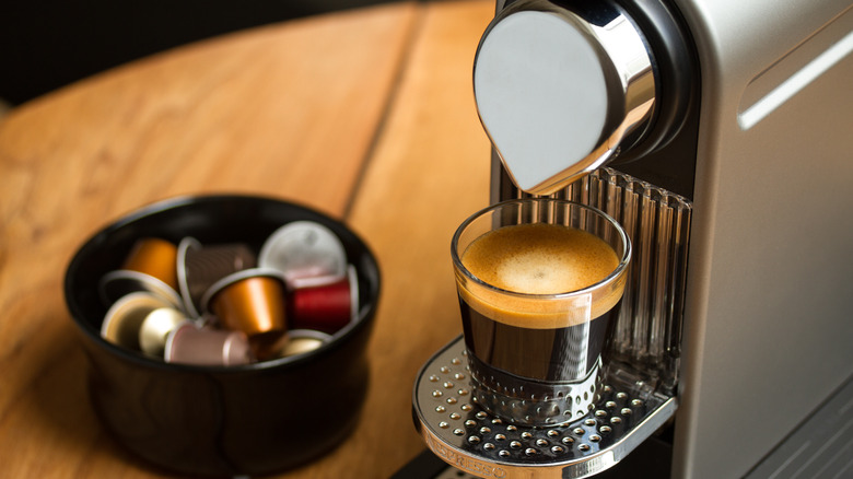 A Nespresso machine with capsules