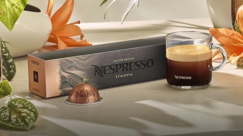 An Ethiopia sleeve next to a cup and pod.