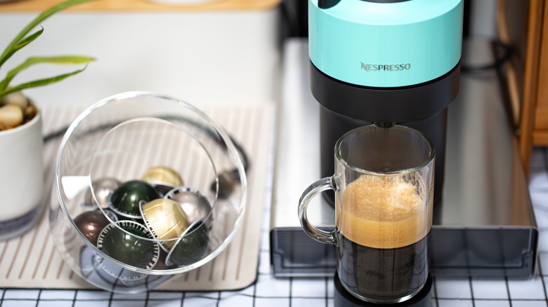 Nespresso machine brewing coffee