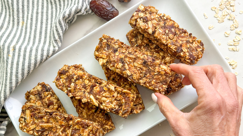 hand holding no-bake oat bars