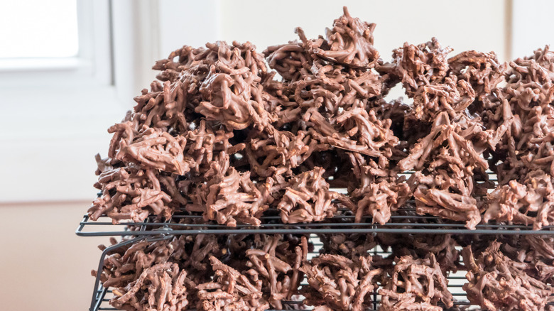 A rack of chocolate and peanut butter haystack cookies