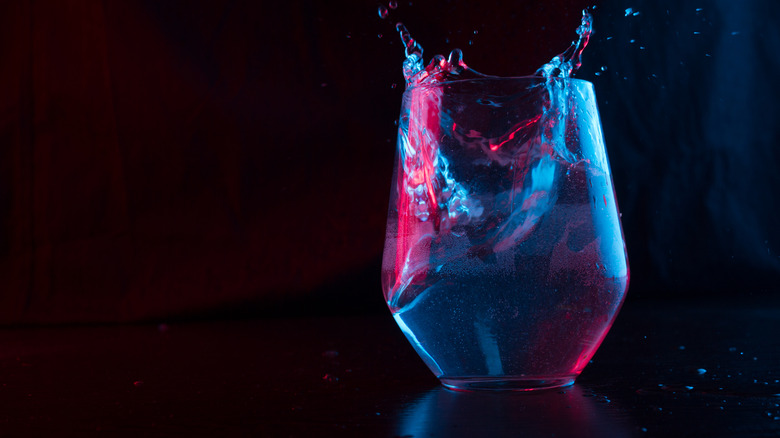 cocktail splash, blue and purple lighting