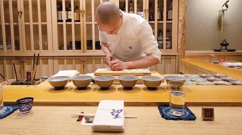 A chef working at Sushi Noz