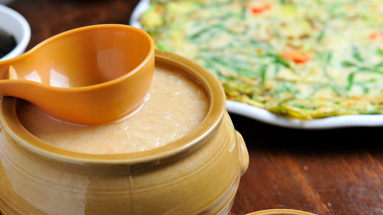 Makgeolli is often drunk with savory pancakes