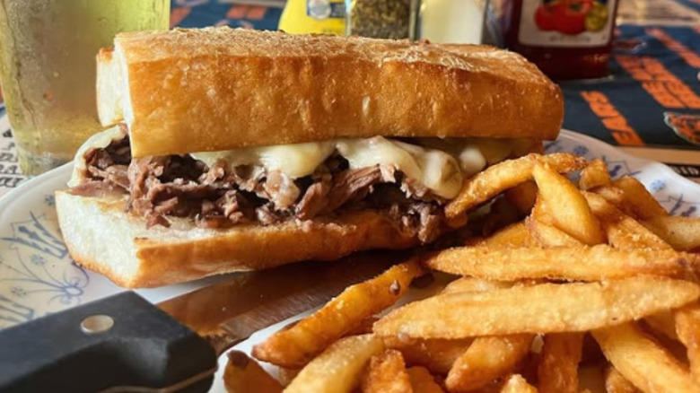 A sandwich and fries at Village Tavern