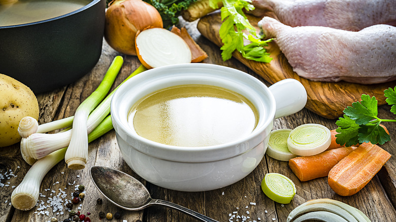 Bowl of stock, vegetables, and chicken