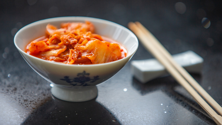 A bowl of kimchi.