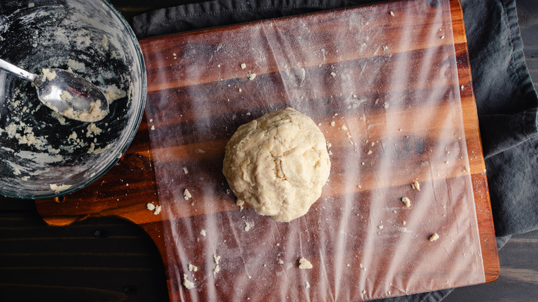 pie disc on plastic wrapped board