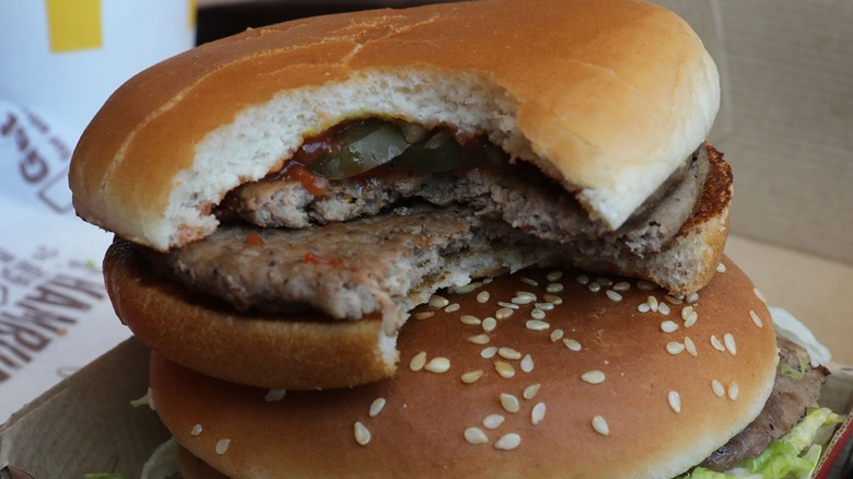 A McDonald's double hamburger layered on another burger.