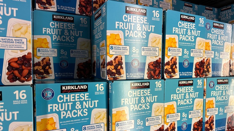 Packs of Kirkland Signature Cheese, Fruit, and Nut Packs on a shelf in Costco