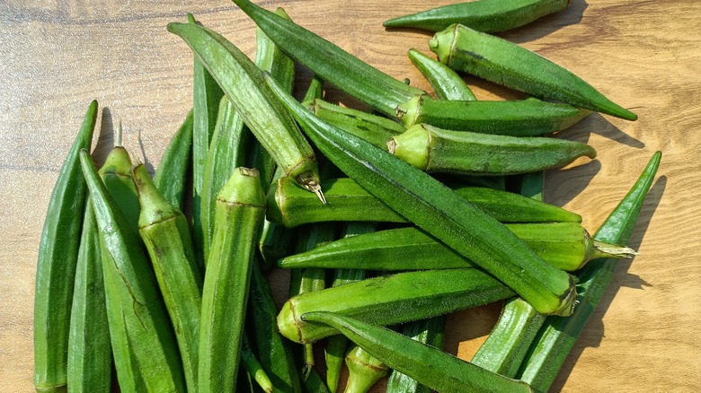 Okra on a brown table