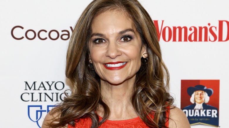 Chef Joy Bauer smiles in red dress