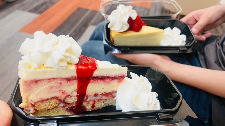 To-go slices of Cheesecake Factory cheesecake.