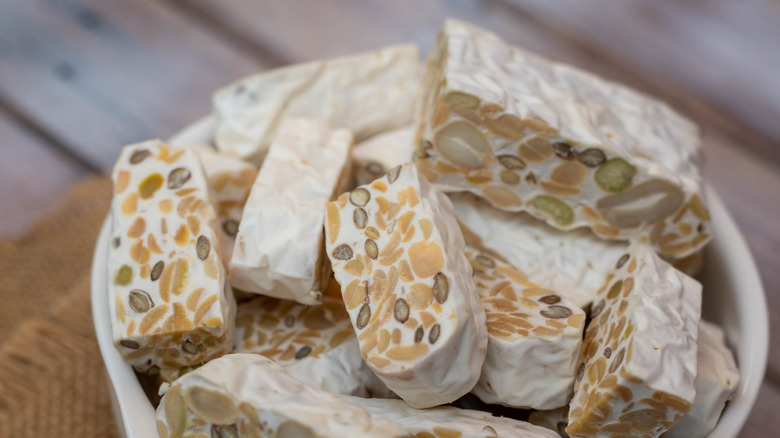 Pieces of tempeh in bowl