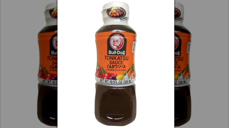 A bottle of Bull-Dog Tonkatsu Sauce on white background