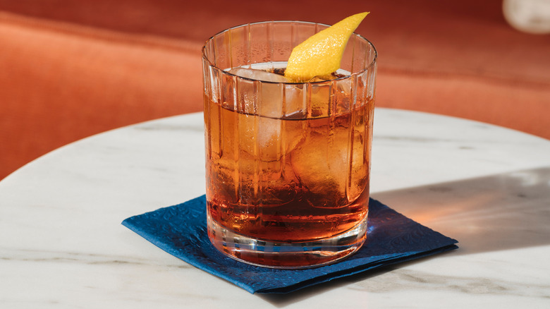 Negroni on blue cocktail napkin