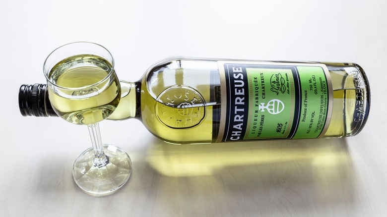 Bottle and glass of chartreuse